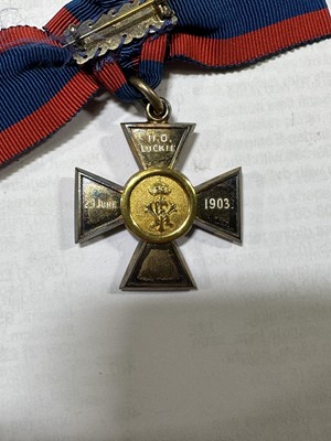 Lot 232 - A collection of medals, badges and awards relating to three main recipients.