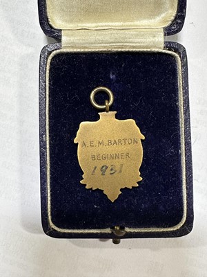Lot 232 - A collection of medals, badges and awards relating to three main recipients.