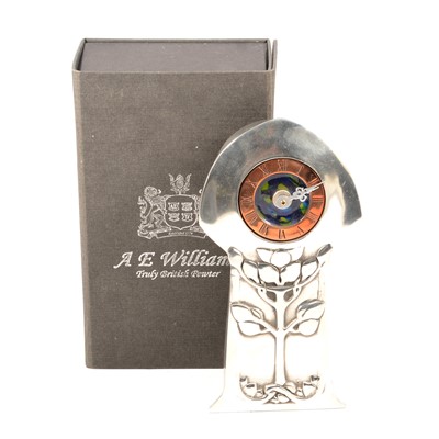 Lot 506 - An Arts and Crafts style pewter and enamel clock by A E Williams, Birmingham