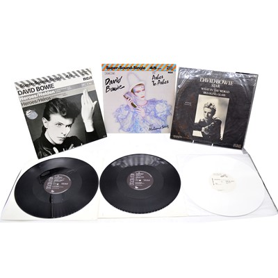 Lot 33 - Seven David Bowie 12" single and EP vinyl records.