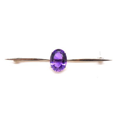 Lot 146 - An amethyst bar brooch.
