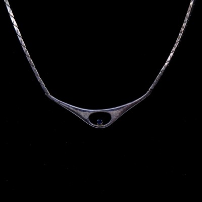 Lot 196 - A sapphire and diamond necklace, and a silver necklace with blue stone.