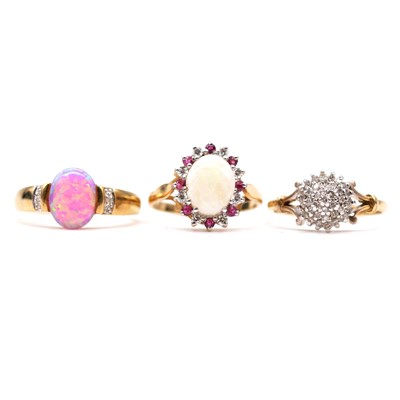 Lot 82 - Three gemset cluster rings.