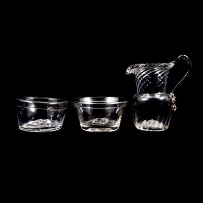 Lot 632 - A cream jug and two glass patty pans