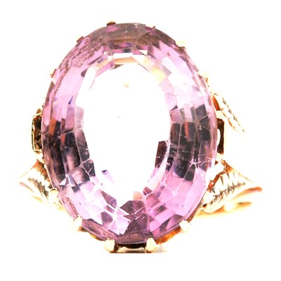 Lot 70 - An amethyst dress ring.