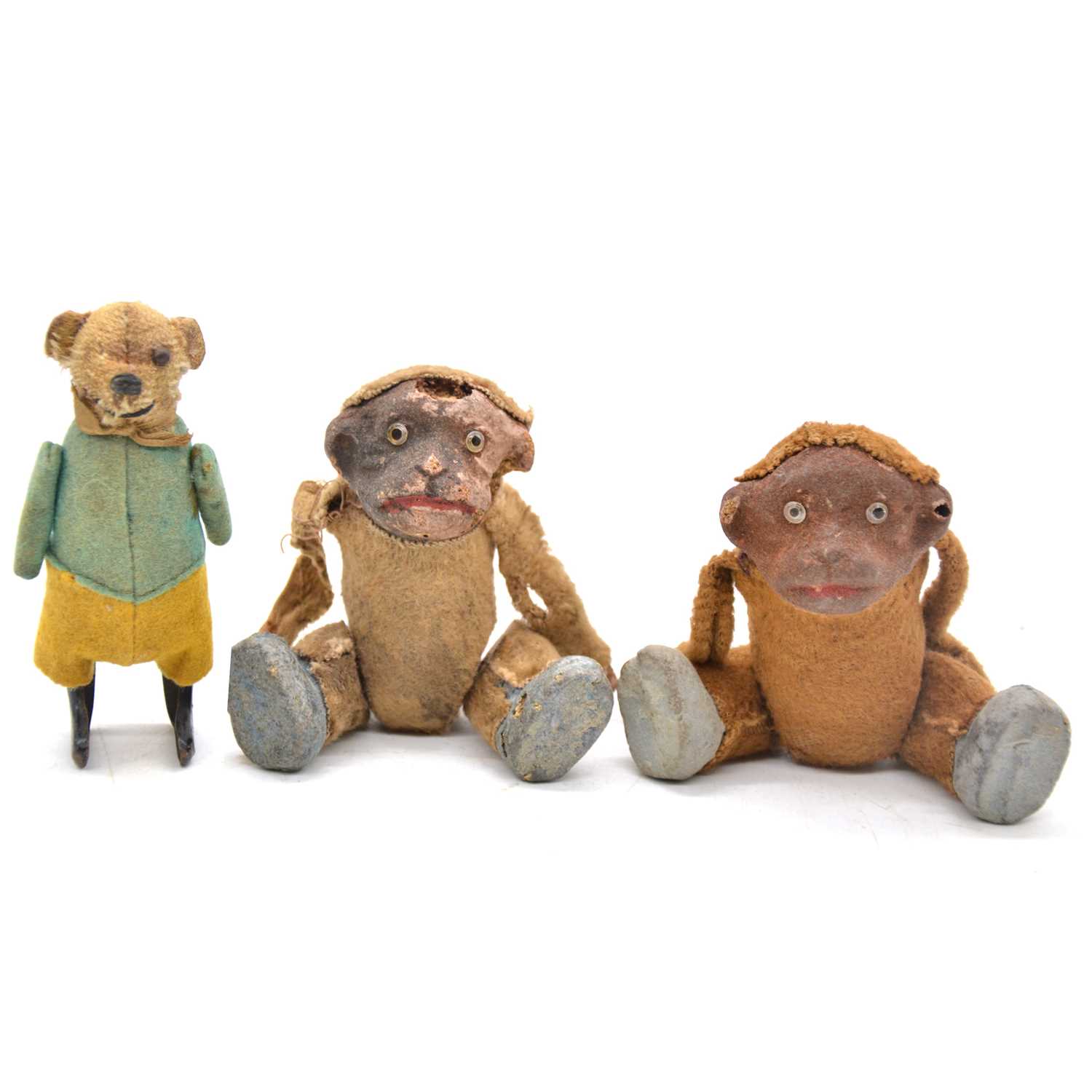 Lot 176 - Schuco Germany clock-work walking bear toy and two monkeys