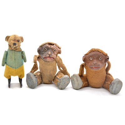 Lot 176 - Schuco Germany clock-work walking bear toy and two monkeys