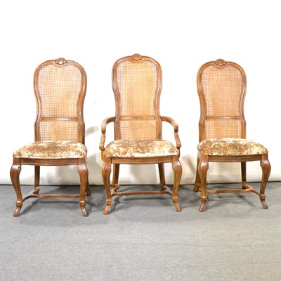 Lot 438 - Modern walnut extending dining table and eight cane-backed chairs