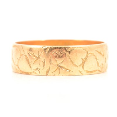 Lot 101 - An 18 carat yellow gold wedding band.