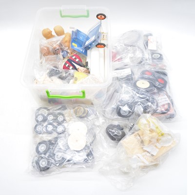 Lot 492 - A box containing model aircraft wheels figures and spares