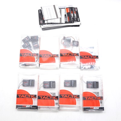 Lot 473 - Four Tactic 624 channel receivers, boxed, with other electronics