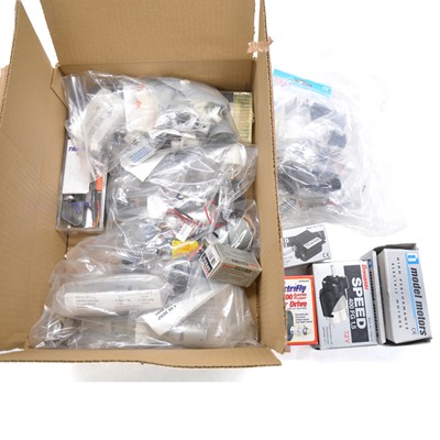 Lot 471 - A box containing model motors, gears and other items, including Graupner