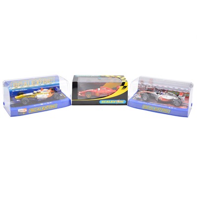 Lot 131 - Three Scalextric F1 slot cars, including Ferrari, boxed
