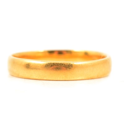 Lot 102 - A  22 carat yellow gold wedding band.