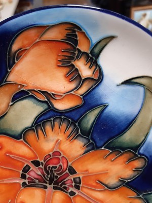 Lot 15 - William Moorcroft and Moorcroft Pottery - four dishes and a bowl.