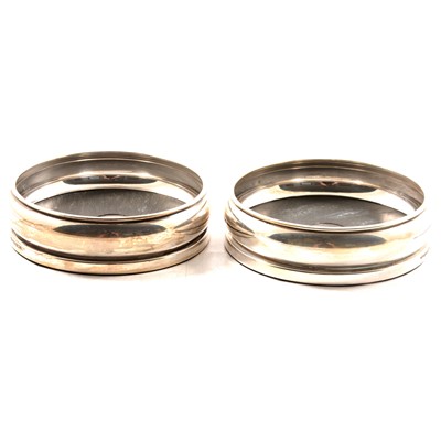 Lot 156 - Pair of silver coasters