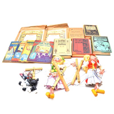 Lot 159 - Three Pelham Puppets, Benjamin Pollock toy theatre sets, and books on puppetry