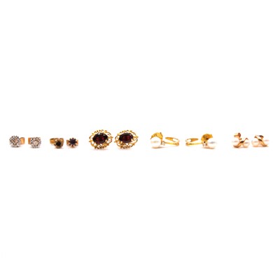 Lot 316 - Six pairs of earrings for pierced ears.