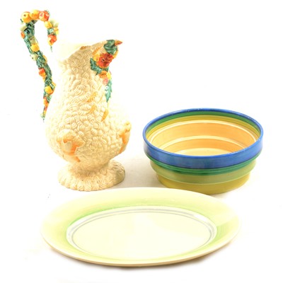 Lot 93 - A quantity of Clarice Cliff honey glazed table ware, Harvest jug, other bowls, books, etc.