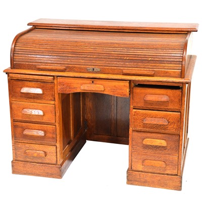 Lot 493 - Oak roll top desk and a swivel chair