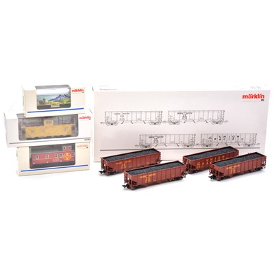 Lot 413 - Marklin HO gauge freight cars, one 4-car set and three others, boxed