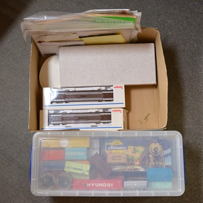 Lot 412 - Two Marklin HO gauge flatbed wagons, with others and a box of loose shipping containers