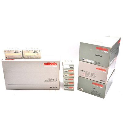 Lot 455 - A box containing Marklin digital control units, mostly boxed