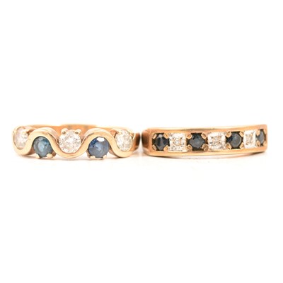 Lot 28 - Two sapphire and diamond half hoop rings.