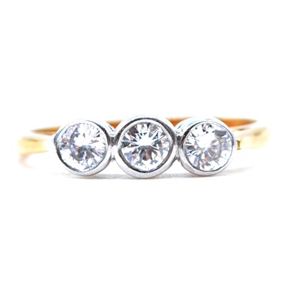 Lot 45 - A diamond three stone ring.