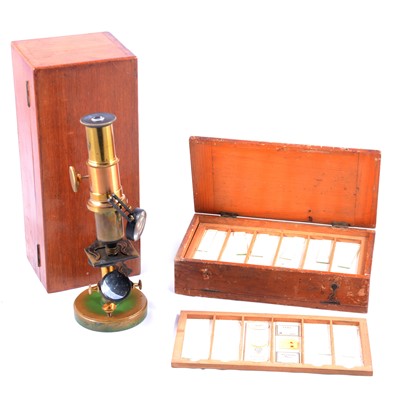 Lot 196 - STudent's microscope, a camera lucida, field microscope, and a slide case.