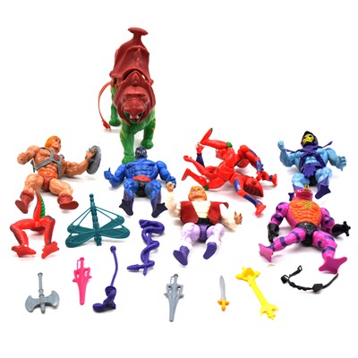 Lot 164 - Seven He-Man action figures