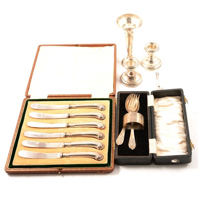 Lot 226 - Set of silver pistol grip handled knives, Christening set, pair of candlesticks and a spill vase