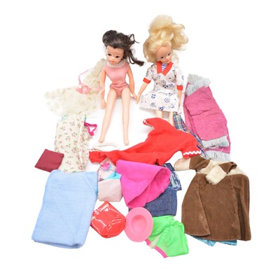 Lot 269 - Two Sindy dolls, with a selection of clothes and accessories