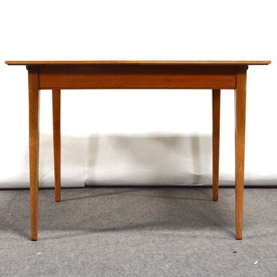 Lot 527 - Mid-century flame veneer extending dining table, possibly Gordon Russell