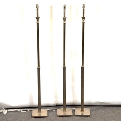 Lot 346 - Three modern chrome standing lamps