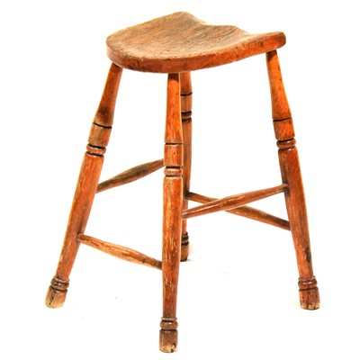 Lot 393 - Elm and beech saddle seat stool