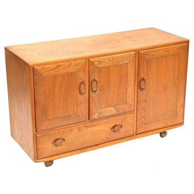 Lot 556 - Ercol, beech and elm small sideboard