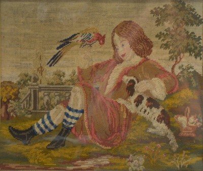 Lot 395 - Georgian needlework panel of a boy in a garden with a spaniel and bird