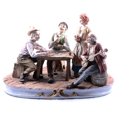 Lot 138 - A large Capodimonte group of card players.