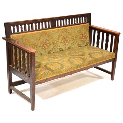 Lot 411 - Edwardian Arts & Crafts style oak settle