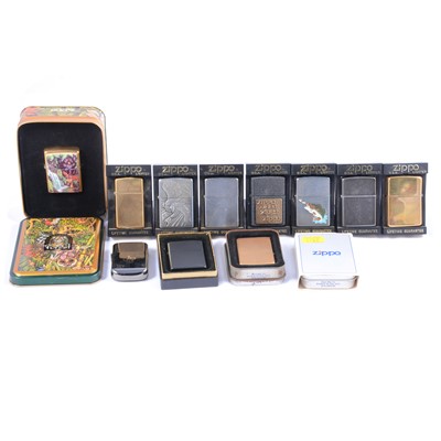 Lot 206 - 11 Zippo cigarette lighters, including the...