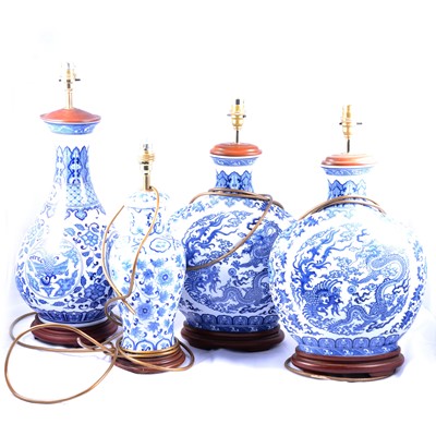 Lot 458 - Four modern Chinese style blue and white table lamps