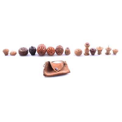 Lot 372 - Five coquilla nut pomanders, other carved nut objects