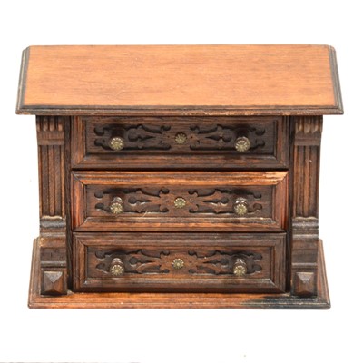 Lot 515 - Carved oak aneroid barometer, and carved wood table top chest of drawers.