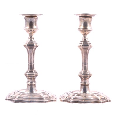 Lot 399 - Pair of Edwardian silver table candlesticks, William Hutton & Sons Ltd, London 1905.