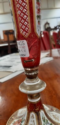 Lot 136 - Bohemian overlaid ruby glass flute and enamelled amber glass flask.