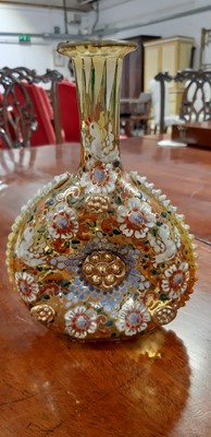 Lot 136 - Bohemian overlaid ruby glass flute and enamelled amber glass flask.
