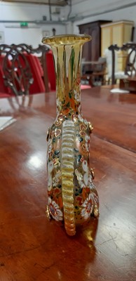 Lot 136 - Bohemian overlaid ruby glass flute and enamelled amber glass flask.