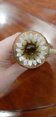 Lot 136 - Bohemian overlaid ruby glass flute and enamelled amber glass flask.
