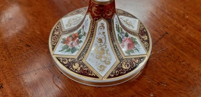 Lot 136 - Bohemian overlaid ruby glass flute and enamelled amber glass flask.